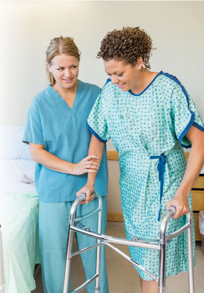 nursing assistant assists patient