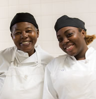 Culinary students with big smiles